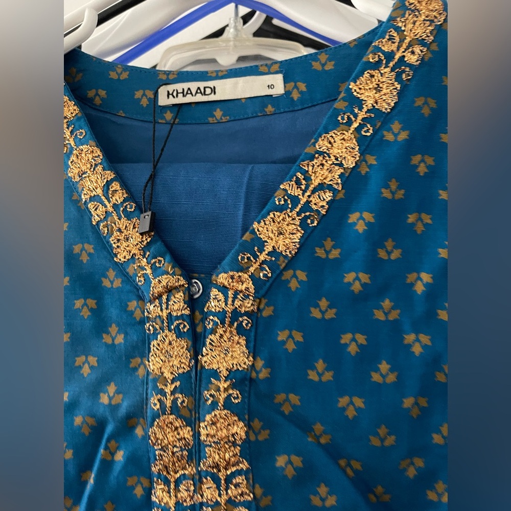 Brand New Khaddi Outfit 2 piece with work on back in Blue and Gold